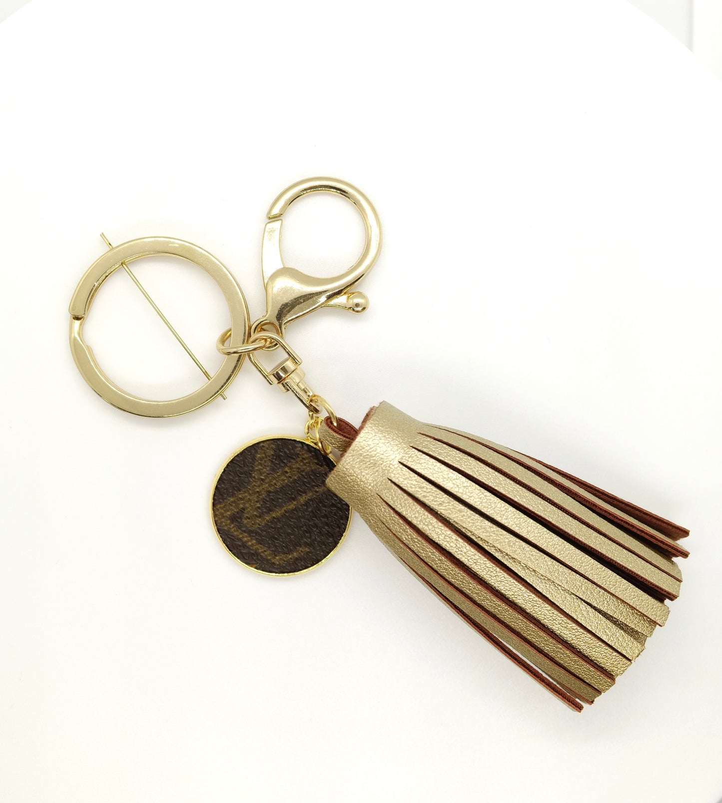 LV Again - Metallic Gold Keychain Tassel With LV Charm